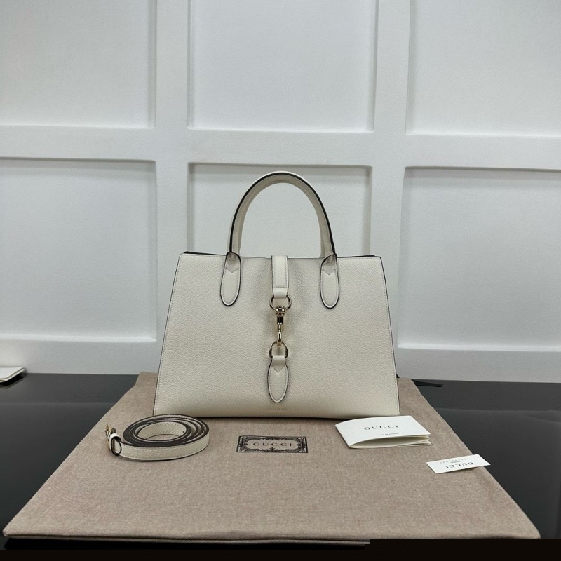 G*u*i top handle bags